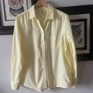 Never worn Uniqlo yellow button up shirt to top size large